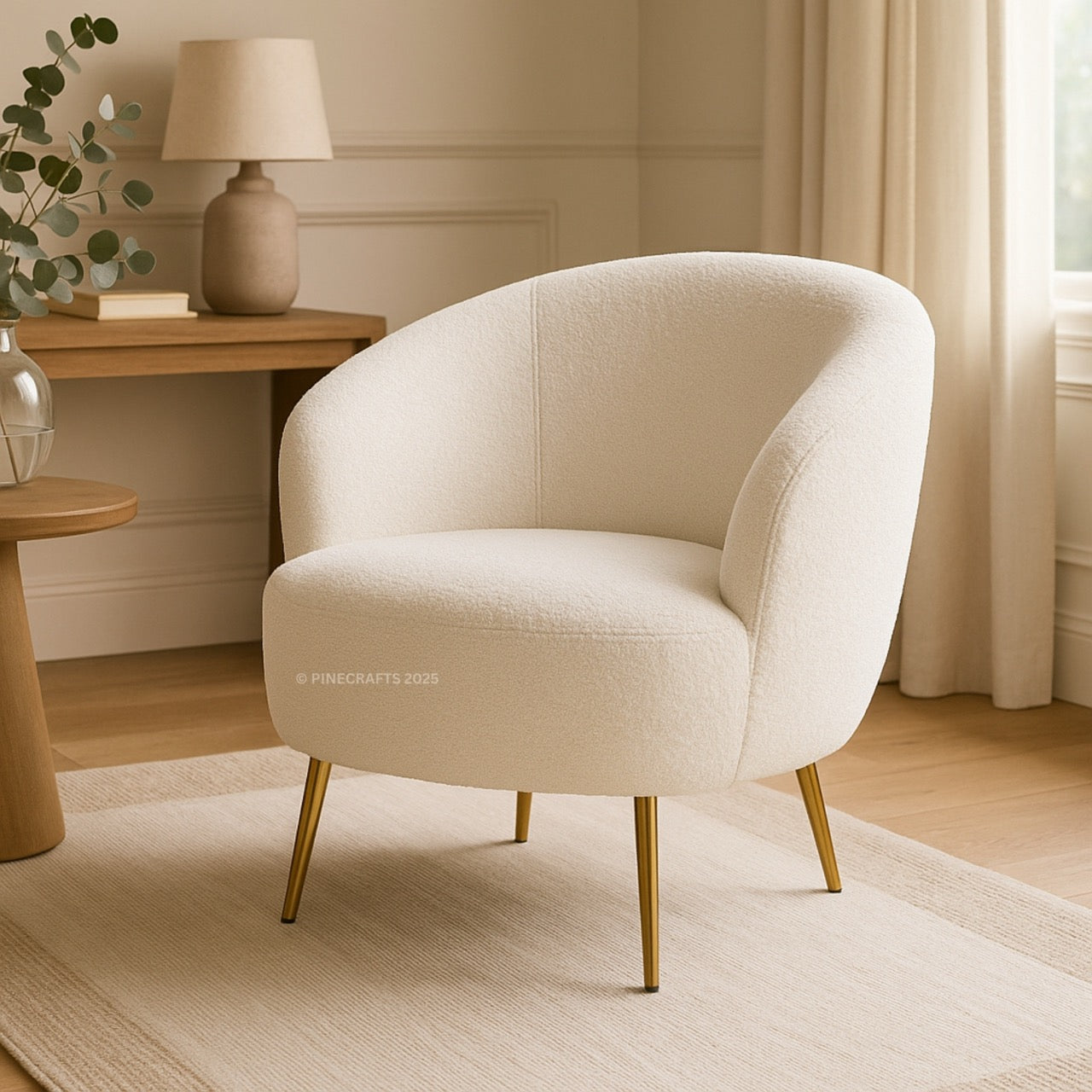 Beige armchair in a cozy room with a lamp and table.